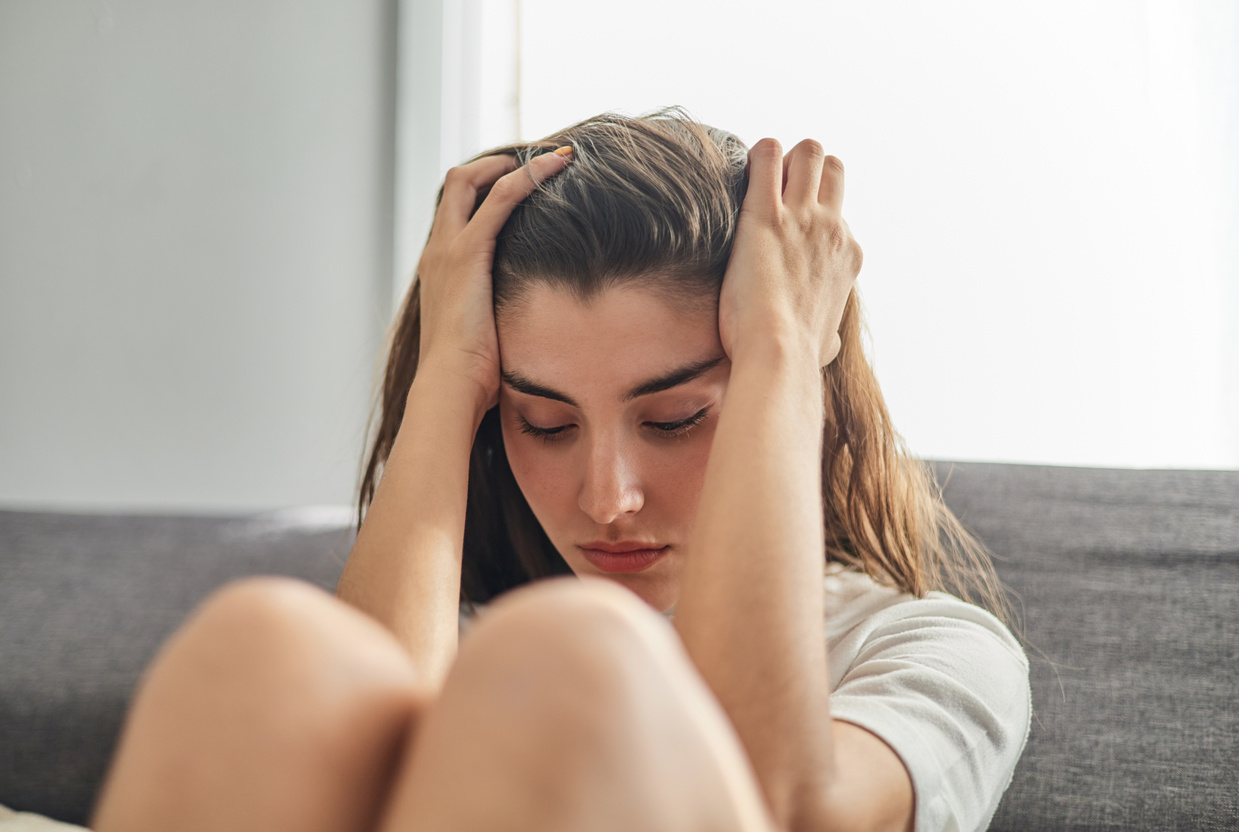 Young teenager crying with anxiety and depression problems